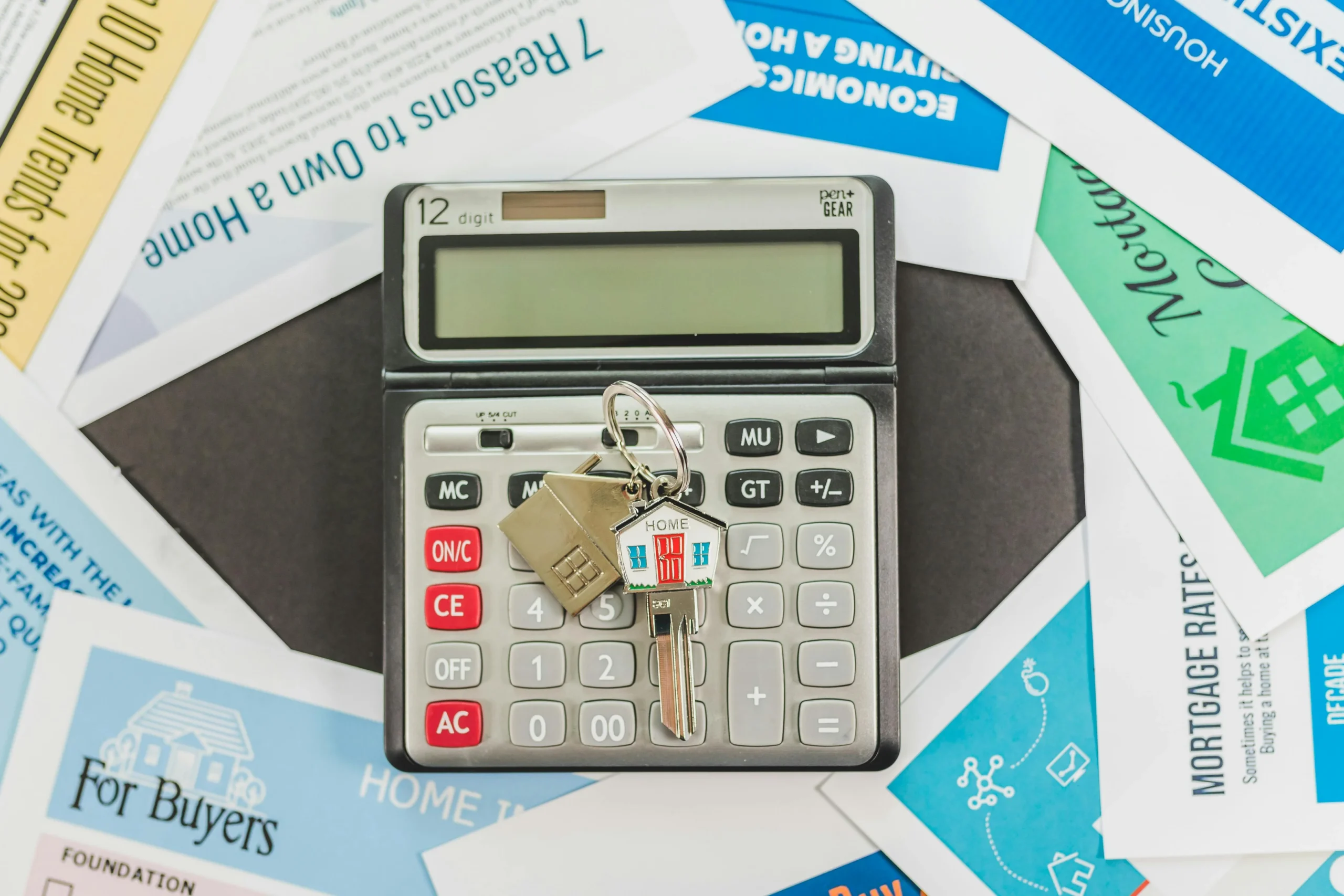 HELOC vs cash out refinance 2026: 7 Ultimate Cost Tips 2 HELOC vs cash out refinance 2026: Calculator with keys and real estate documents symbolizes home buying finances