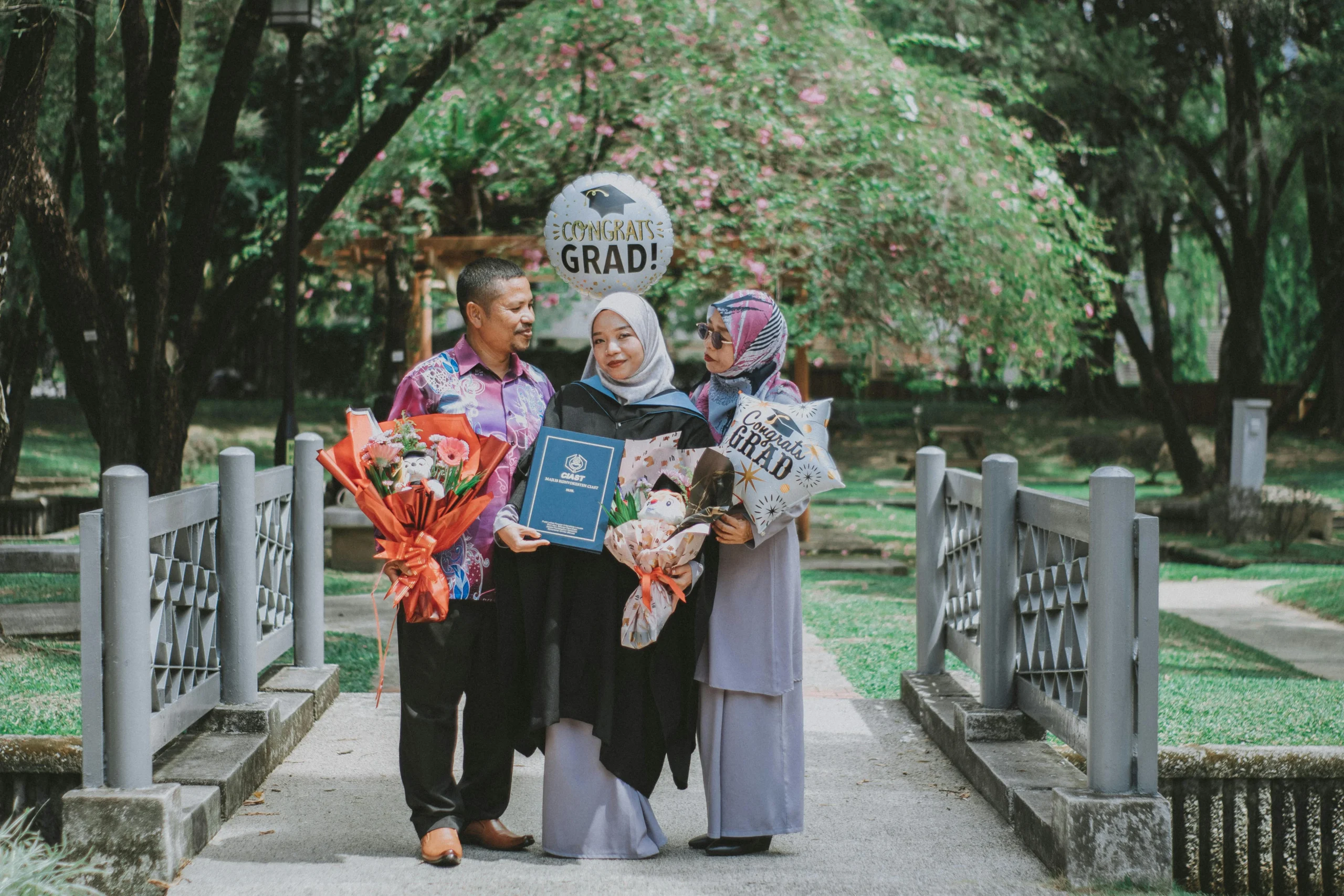 Save More: 529 plan state tax benefits 2026 — Ultimate Guide 1 529 plan state tax benefits 2026: Family celebrating graduation with balloons and flowers in a park