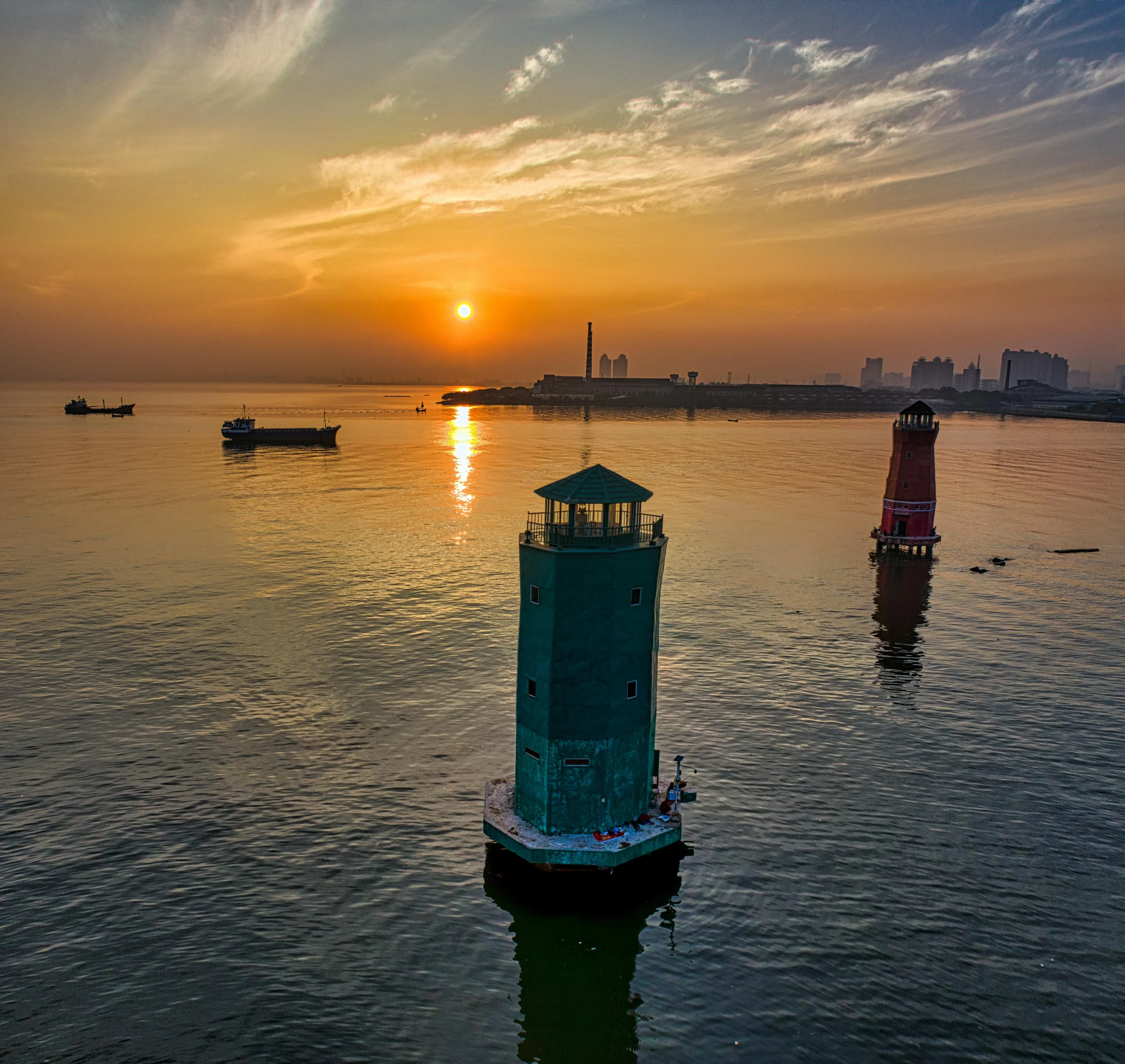 bond ladder strategy 2026: A breathtaking view of two lighthouses at sunrise over the calm sea near Jakarta, Indonesia