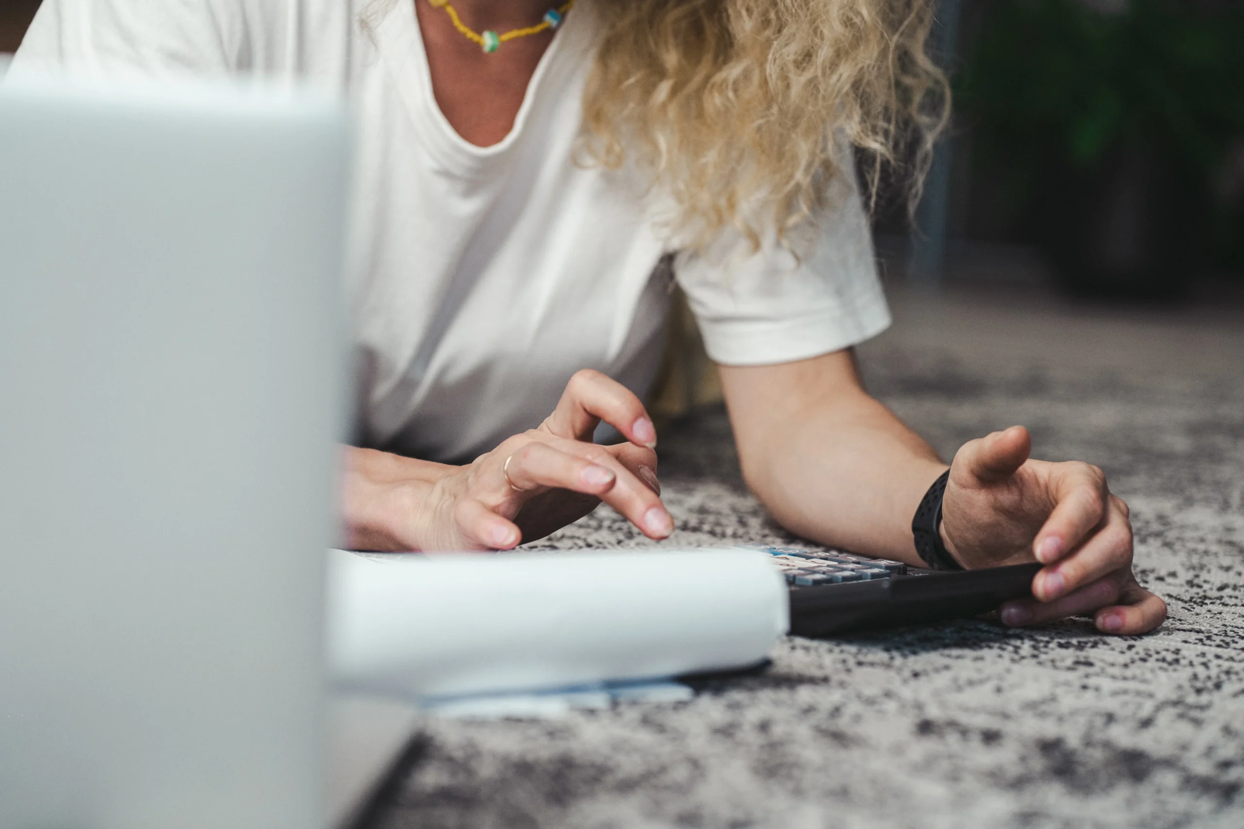 SEP IRA vs solo 401k side hustle 2026: Ultimate Guide 1 SEP IRA vs solo 401k side hustle 2026: A woman engages in budget planning using a calculator on a comfortable carpeted floor