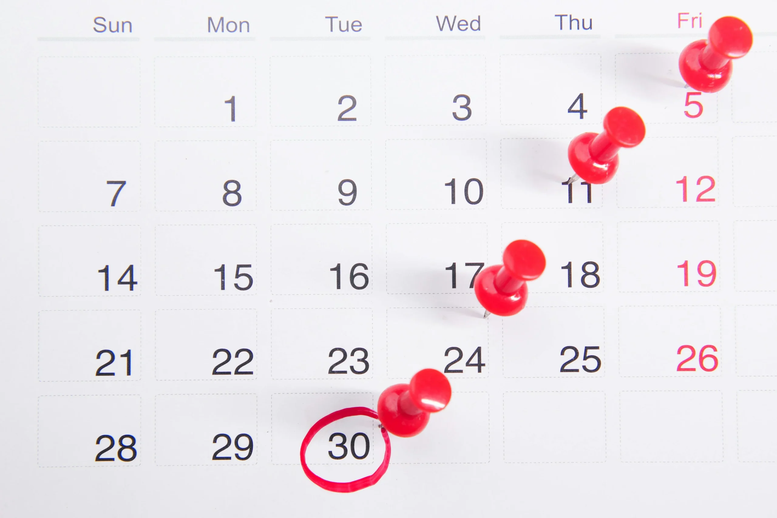 PSLF buyback 2026: Ultimate Guide to Save $25,000 Fast 2 PSLF buyback 2026: Close-up of a calendar with red push pins marking important dates, emphasizing deadlines