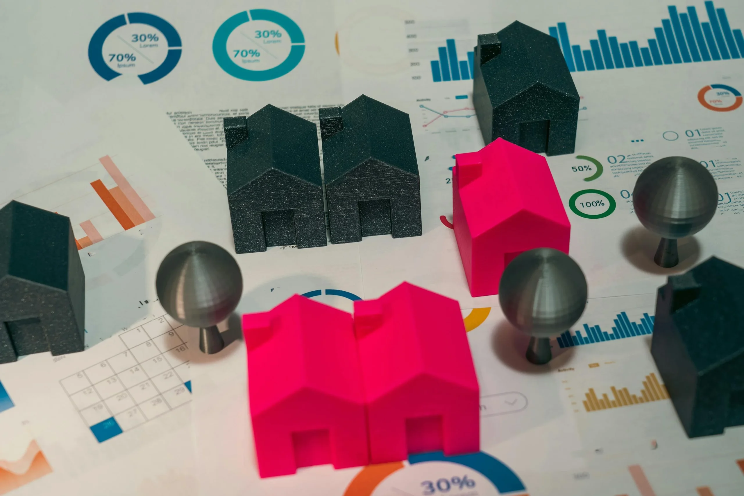 sell a house — Abstract representation of real estate market analysis with model houses and charts.