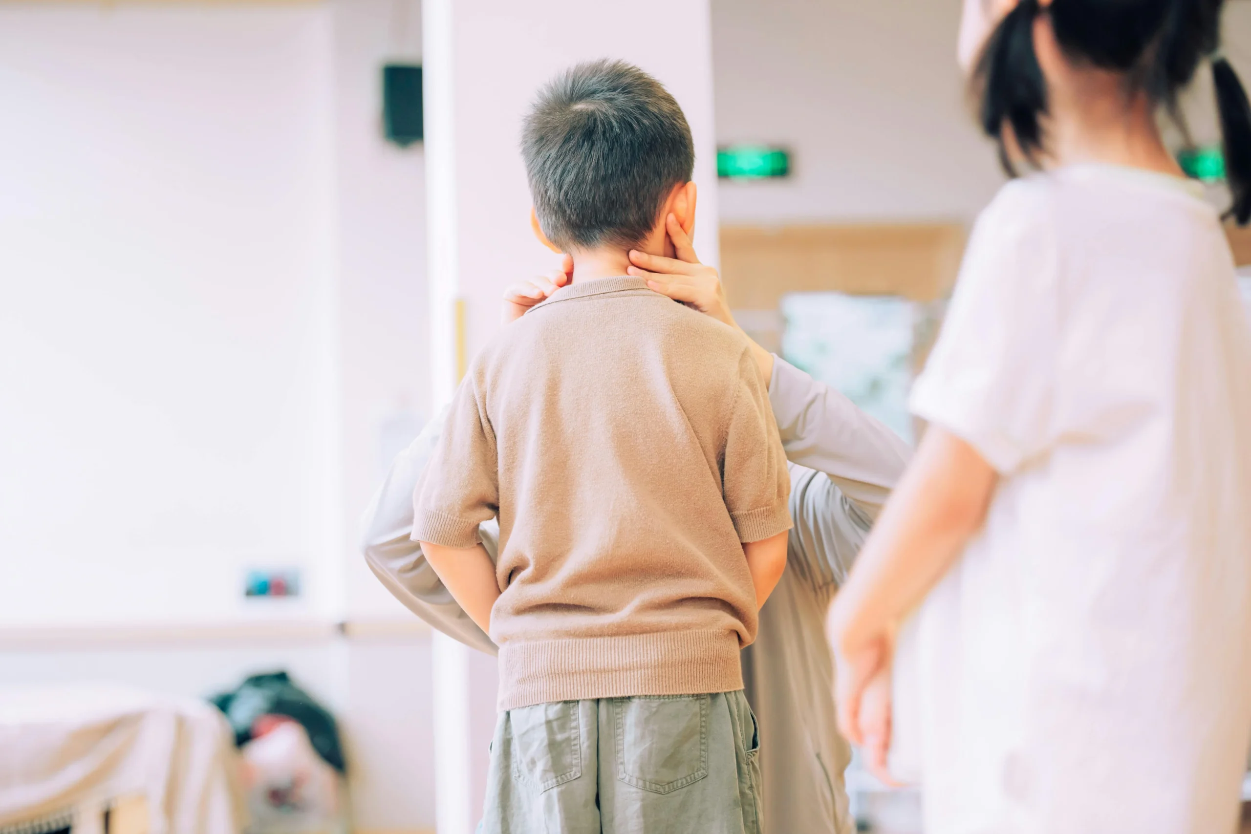 tax credits for families 2026: Young child being examined by a medical professional in a healthcare environment