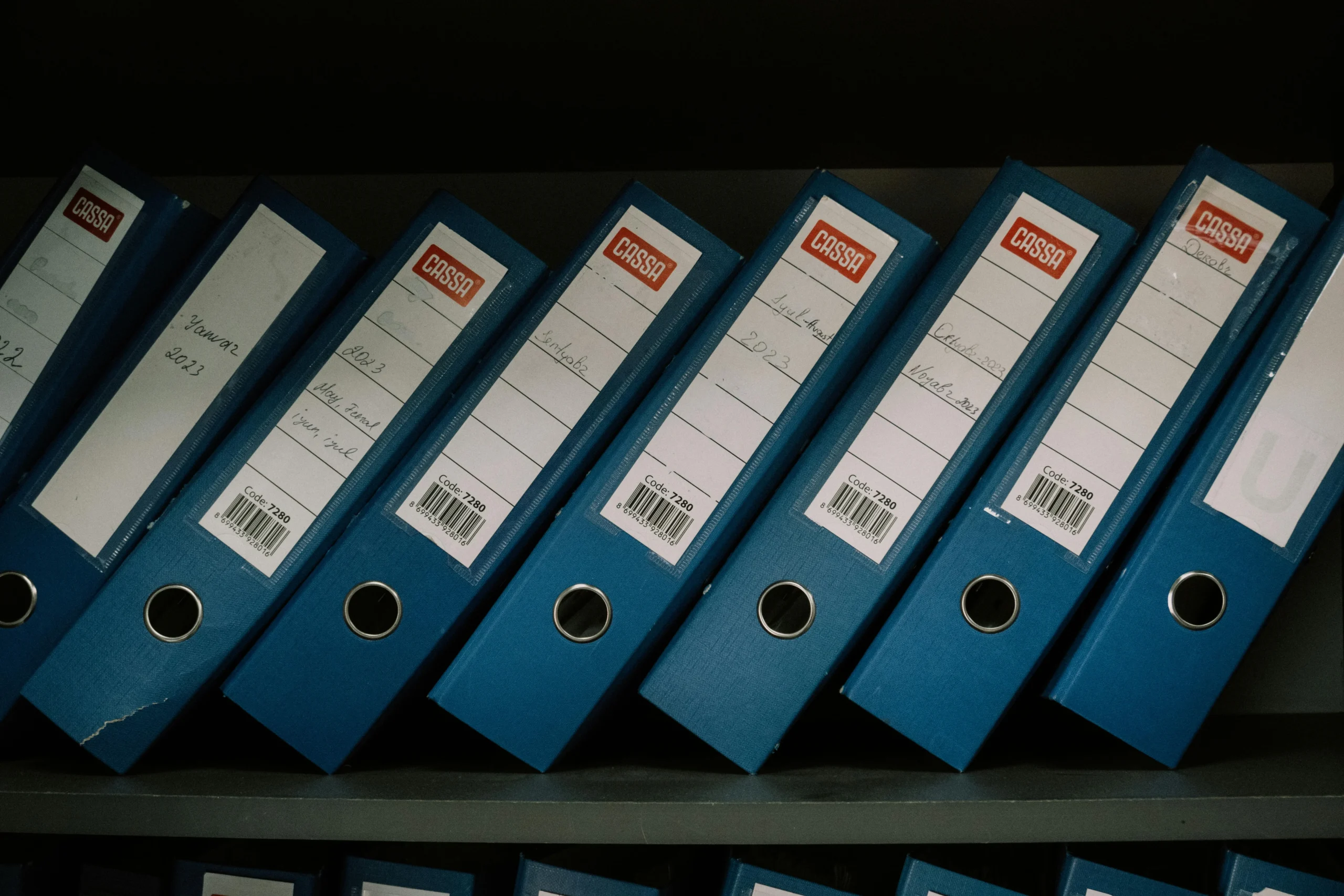 Tax Efficient ETF Portfolio 2026: Ultimate 7-Step Guide 2 tax efficient ETF portfolio 2026: Neatly arranged blue office binders labeled with dates and names for organized storage